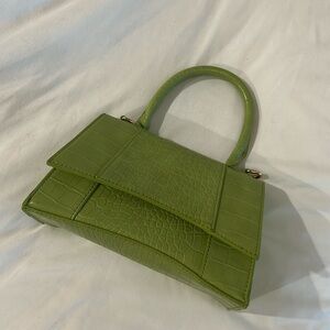 Green mini croc purse.